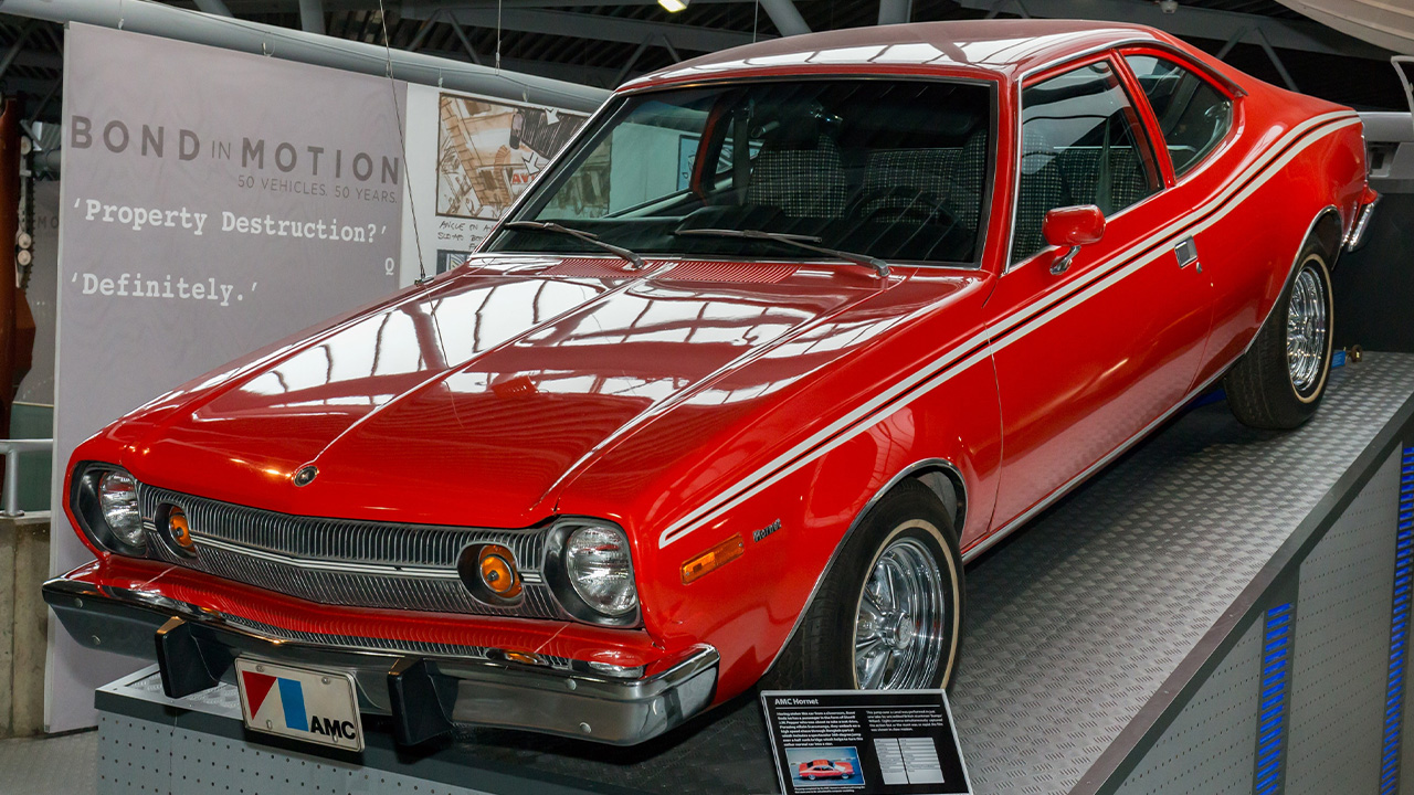 Red AMC Hornet, parked on ramps