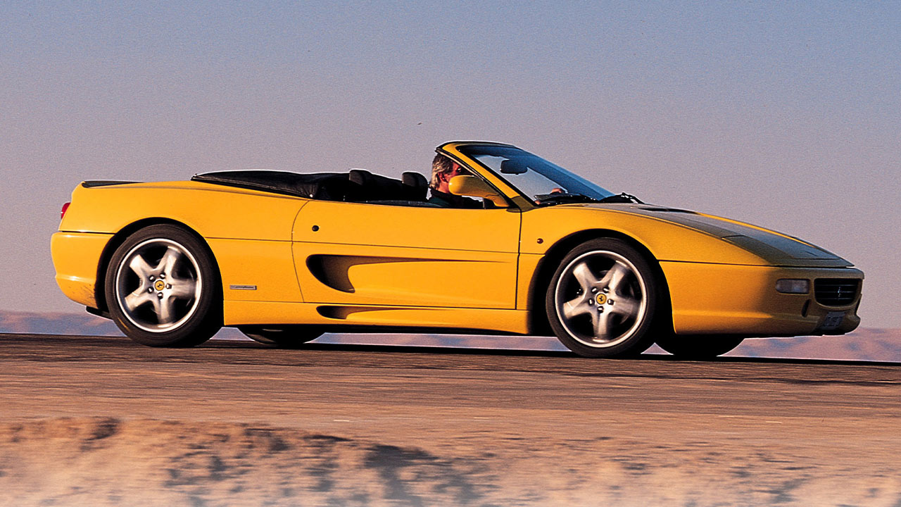 Yellow Ferrari F355 Spider, driving