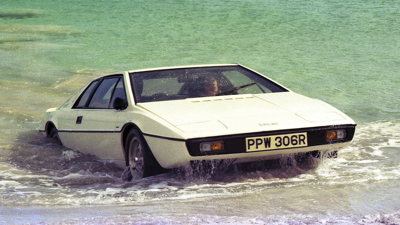 James Bond Lotus Esprit pulling onto a beach after leaving the sea