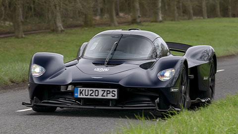 Black Aston Martin Valkyrie, driving