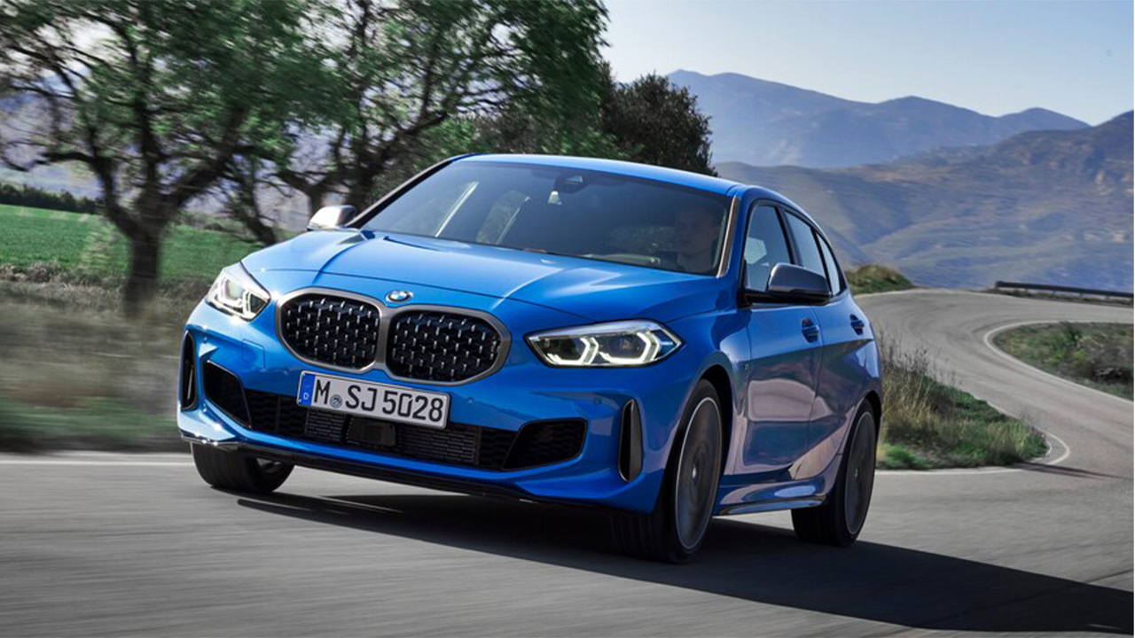 Blue BMW 1 Series, driving