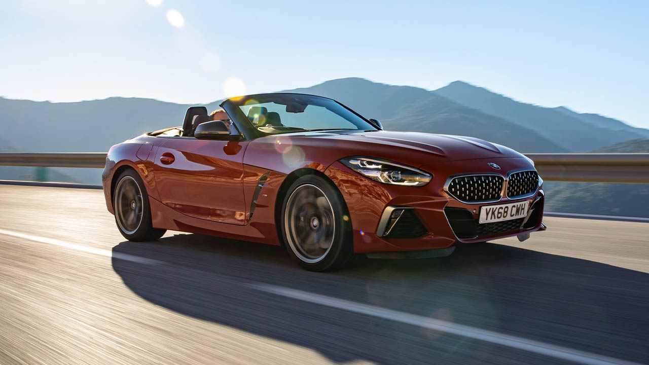 red bmw z4, driving