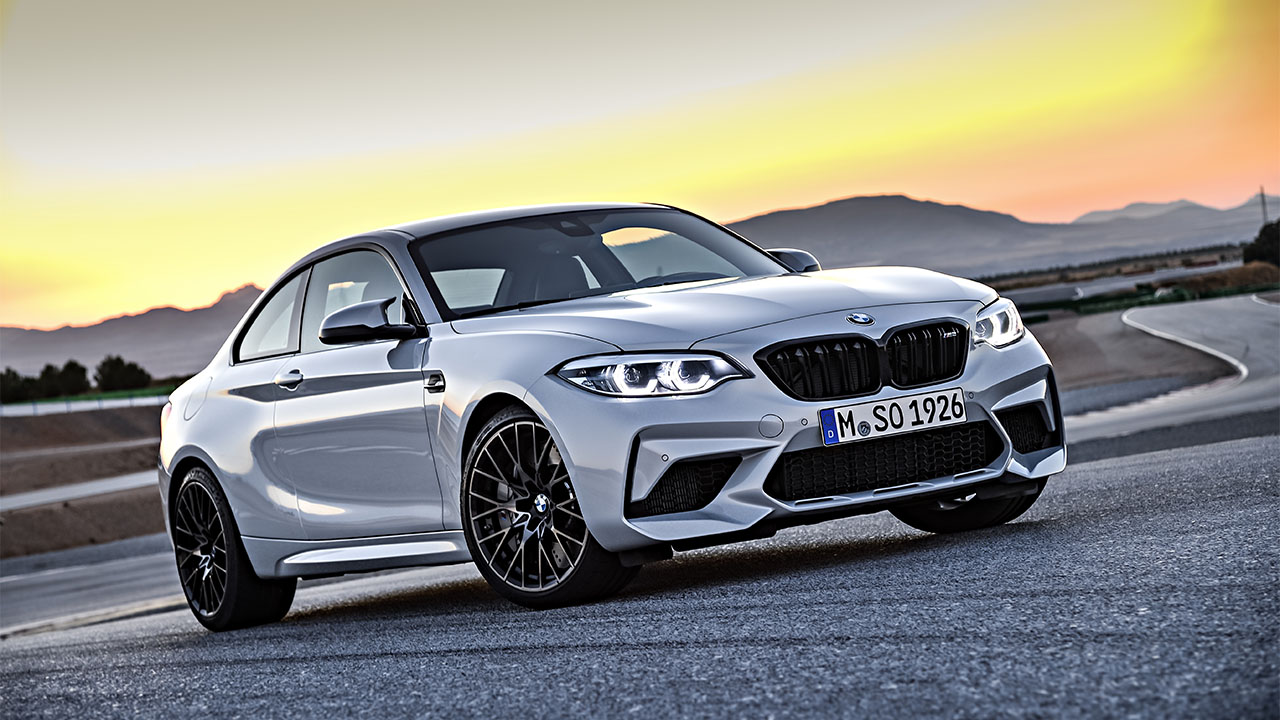 Silver BMW M2 Competition, parked on racing track