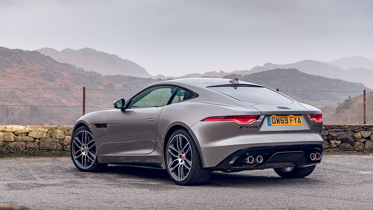Grey Jaguar F-TYPE, parked in countryside