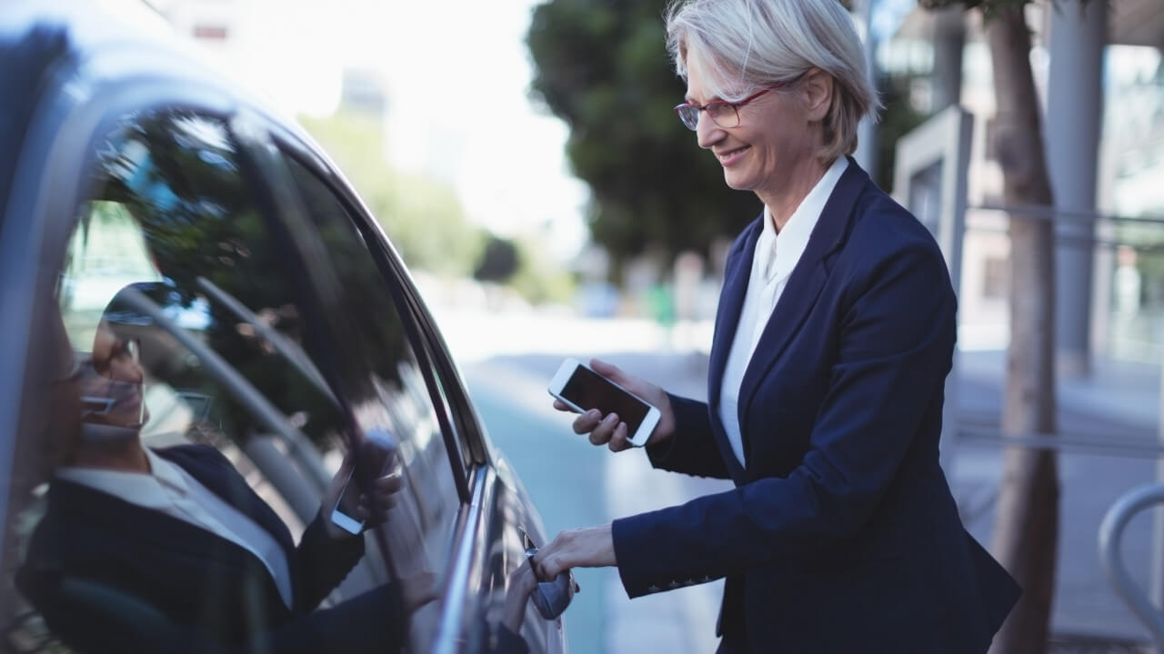 Business Woman Opening Car