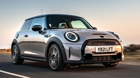 MINI Hatchback, driving in sunset