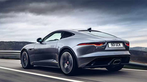 grey jaguar f-type driving
