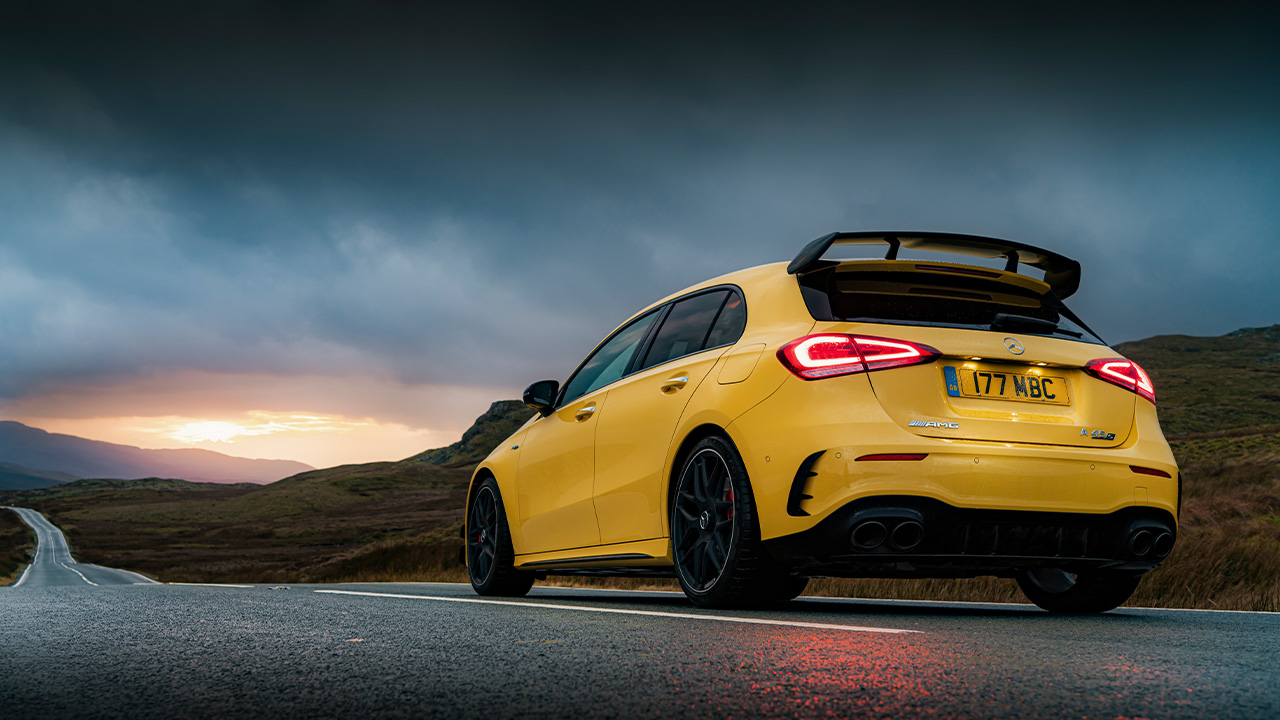 Yellow Mercedes-AMG A-Class, parked