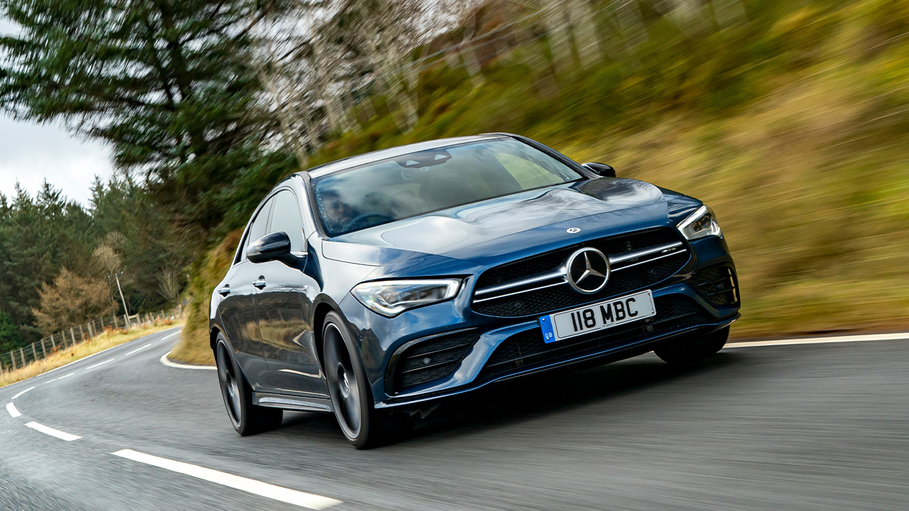 Blue Mercedes-AMG CLA, driving down country road