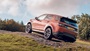 Orange Land Rover Discovery Sport, off-roading incline