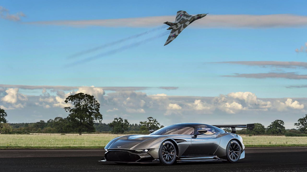 Aston Martin Vulcan Car on the Ground with the Avro Vulcan Strategic Bomber Flying Above