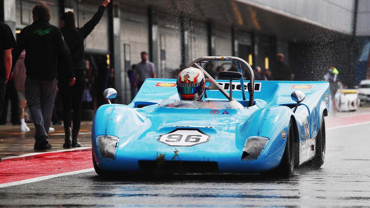 Blue racing car in the pitlane at Silverstone
