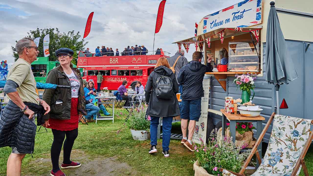 Silverstone Classic visitors queueing at one of the food vendors