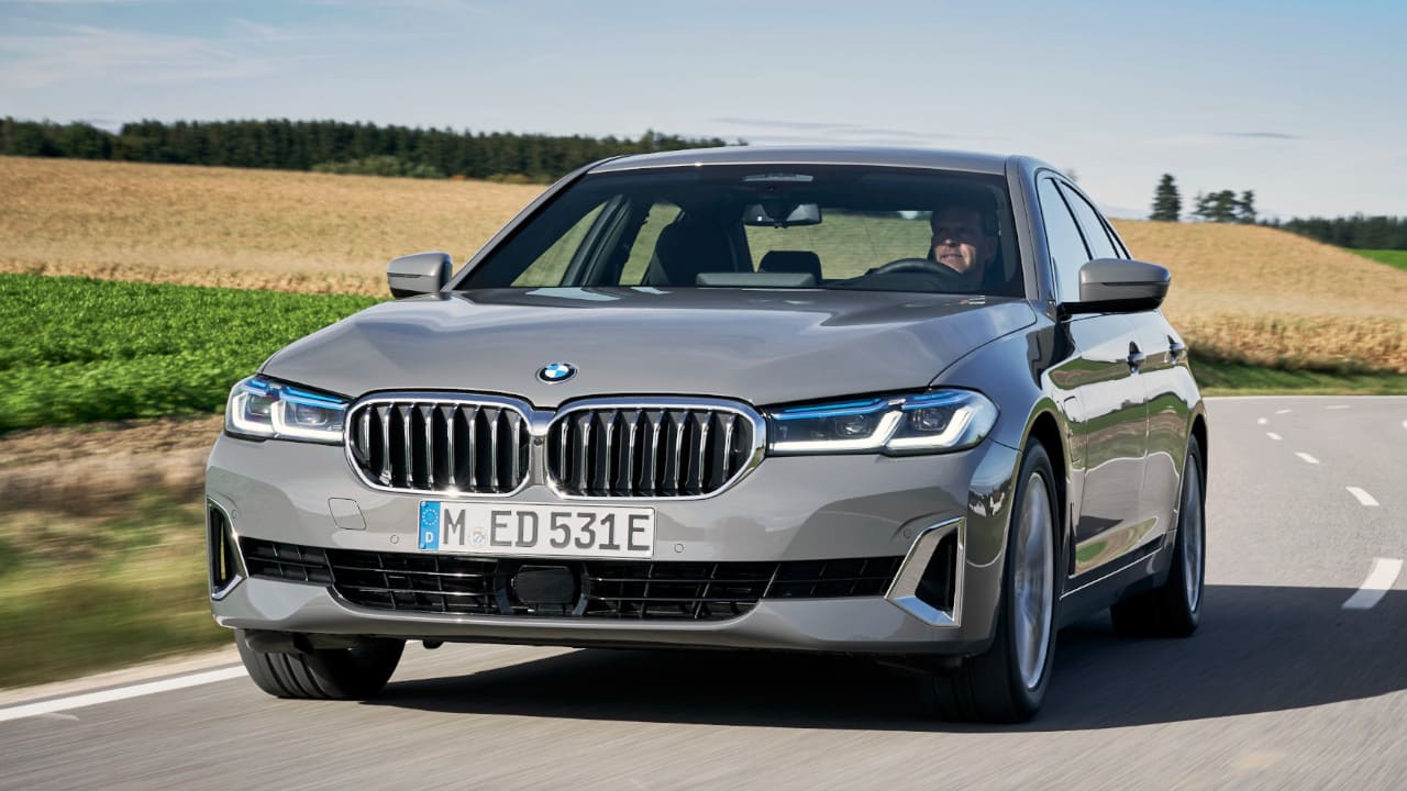 Grey BMW 5 Series Exterior Front Driving