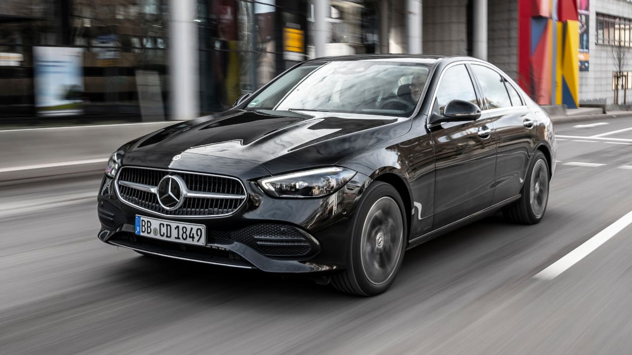 Black Mercedes-Benz C-Class Exterior Front Driving