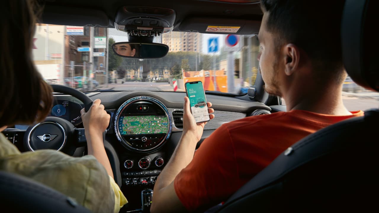Male in Passenger Seat of Car on the MINI Connected Mobile Application