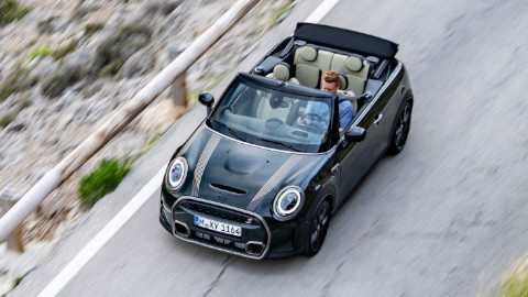 Aerial Image of Black MINI Convertible Driving on Mountain Road