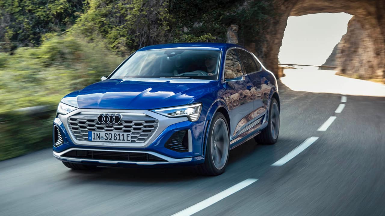 Blue Audi SQ8 Sportback e-tron Driving On Road