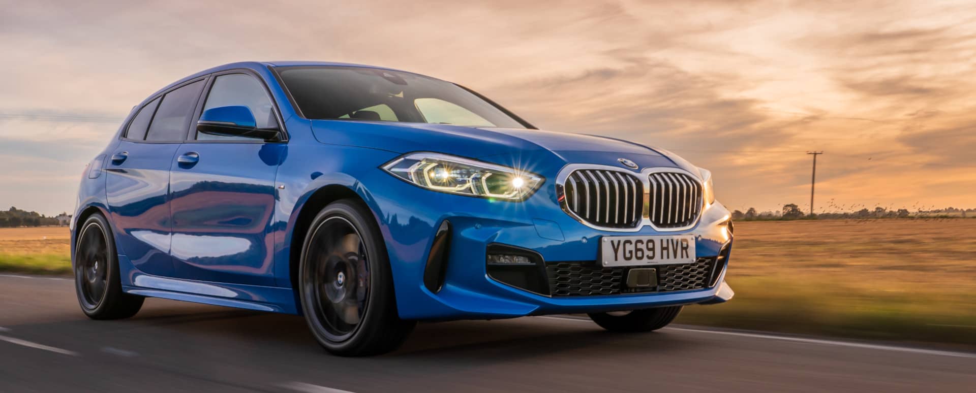 BMW 1 Series M Sport in Blue Driving 