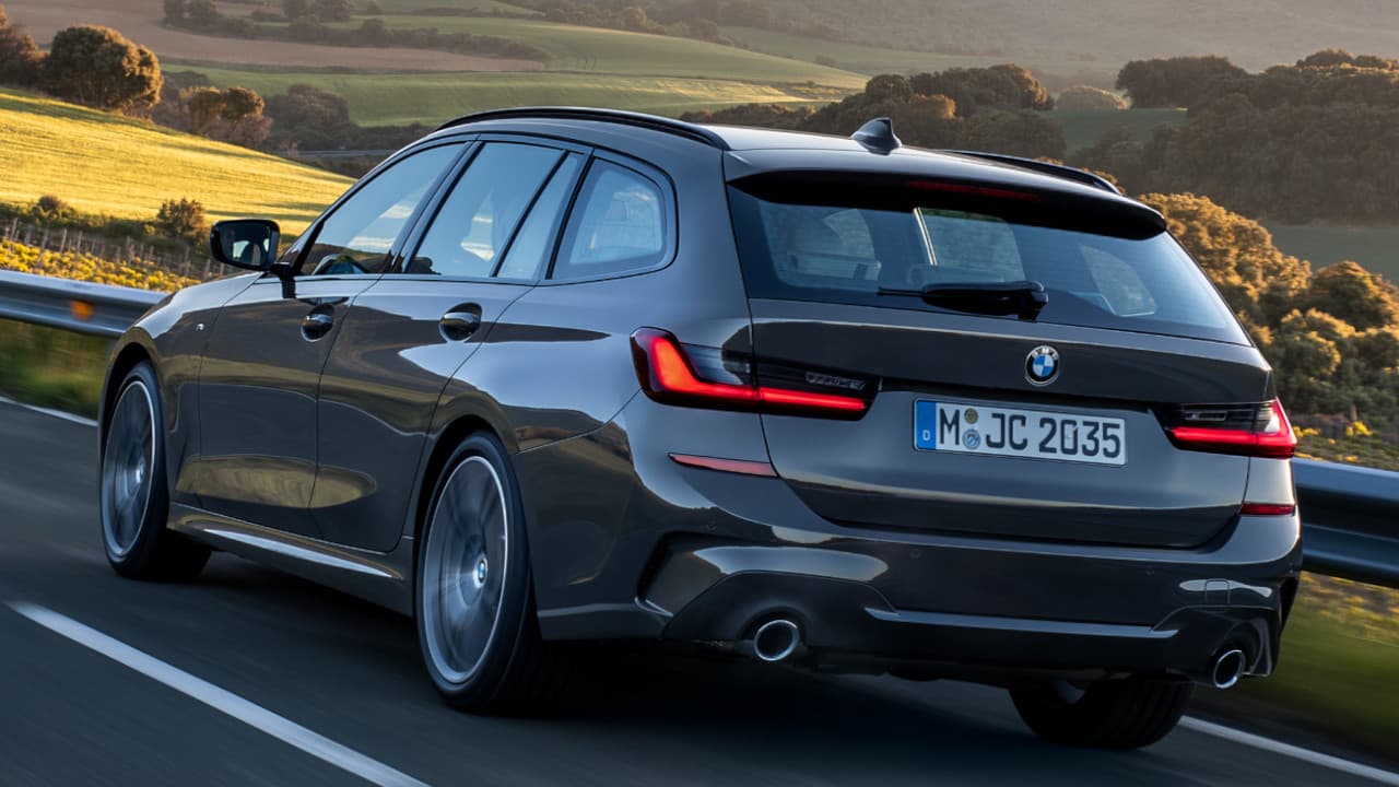 BMW 3 Series M Sport Touring Driving Rear Angle