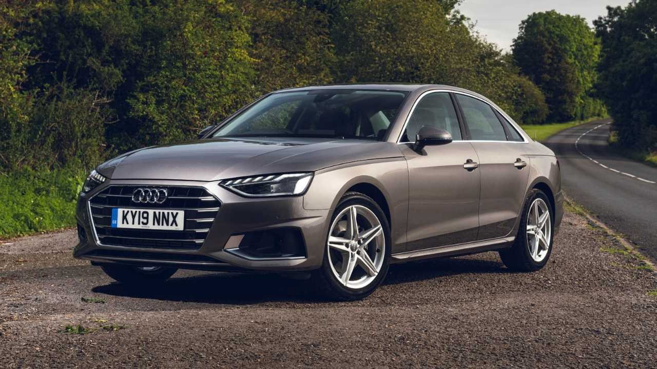 Grey Audi A4 parked on the side of the road