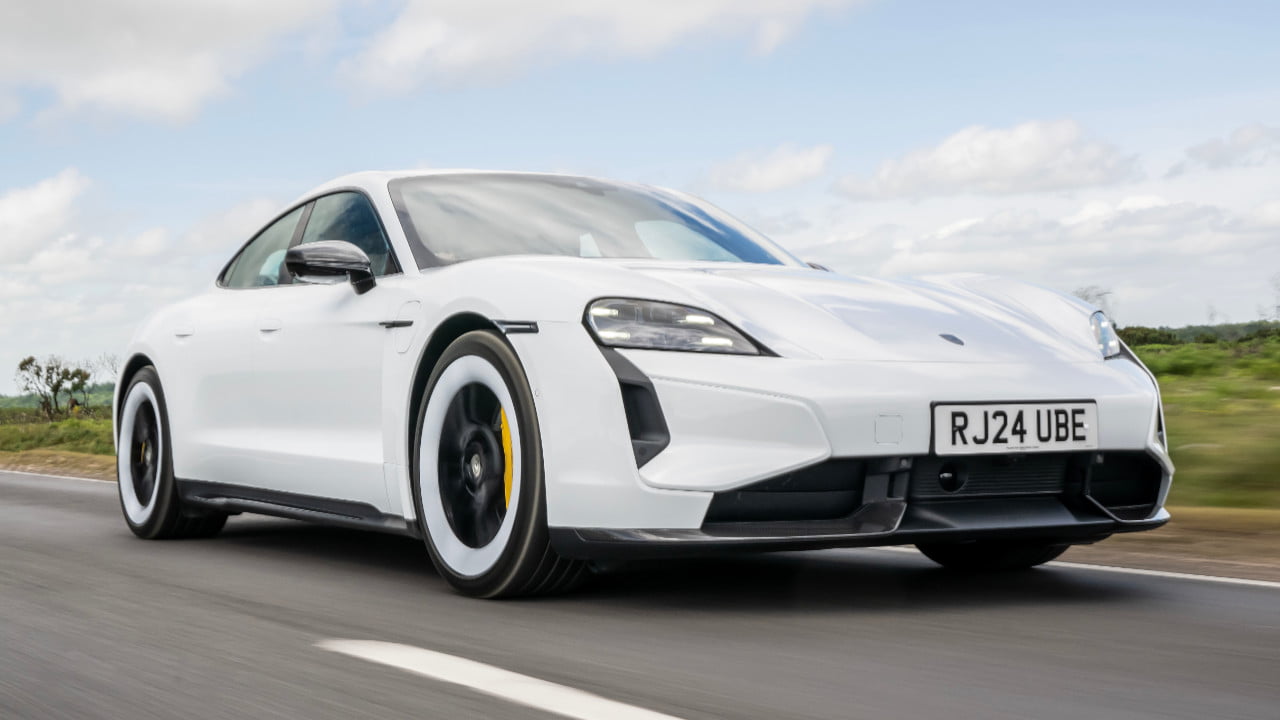 Porsche Taycan Turbo S in White Driving