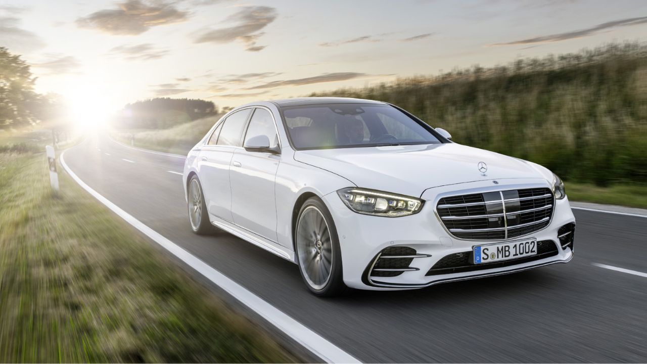 White Mercedes-Benz S-Class driving on the motorway