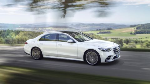 White Mercedes-Benz S-Class driving on the motorway