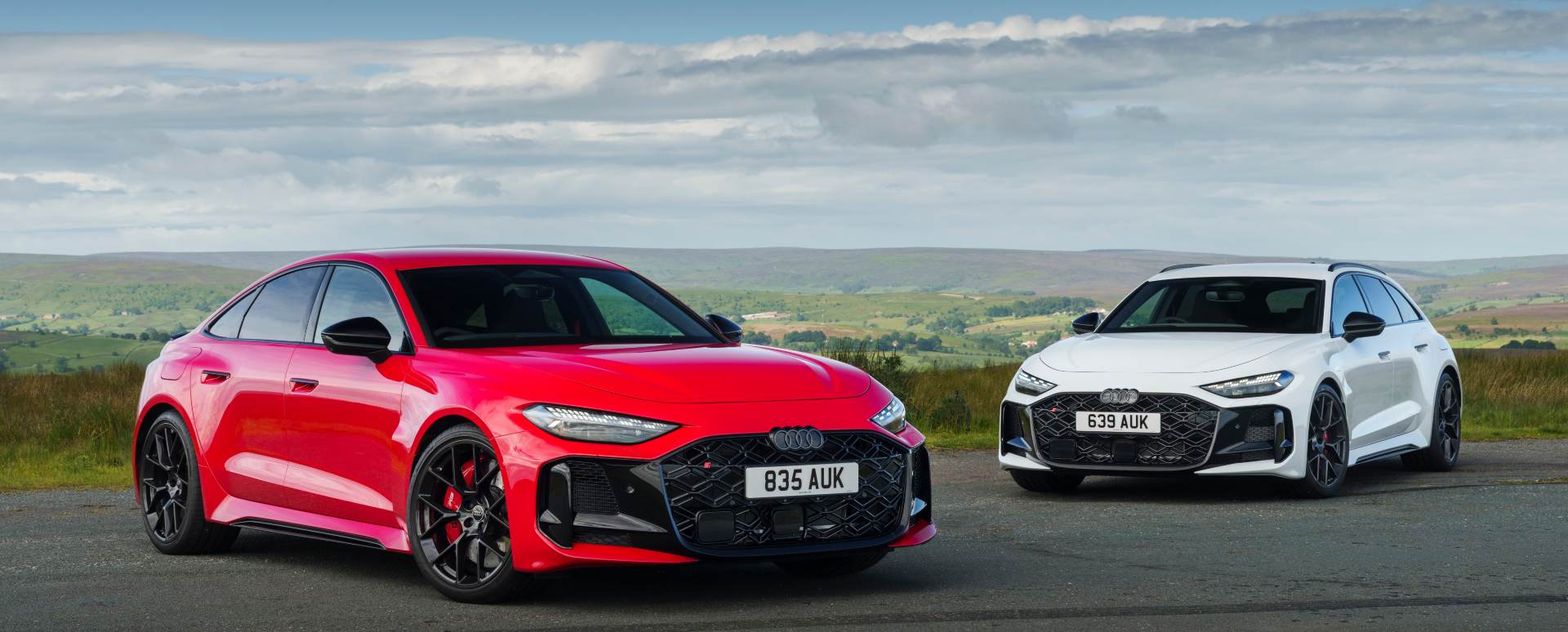 Audi RS 5 Sportback and RS 5 Avant performance models parked outdoors