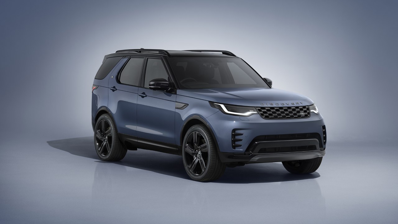 Blue Discovery SUV shown in a studio setting highlighting premium design and practicality