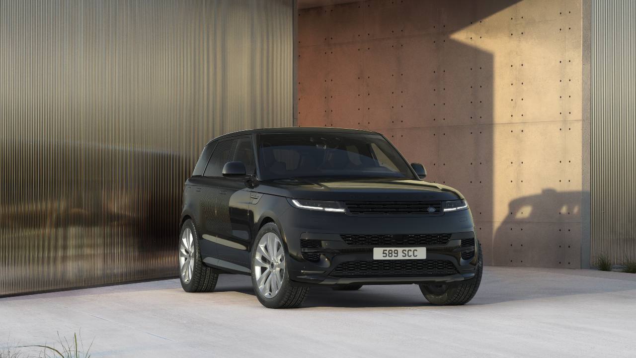 Range Rover Sport luxury SUV parked outside a modern architectural building