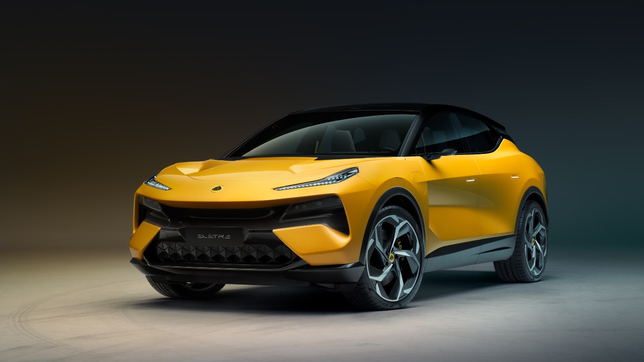 Yellow Lotus Eletre electric SUV shown from the front in a studio setting