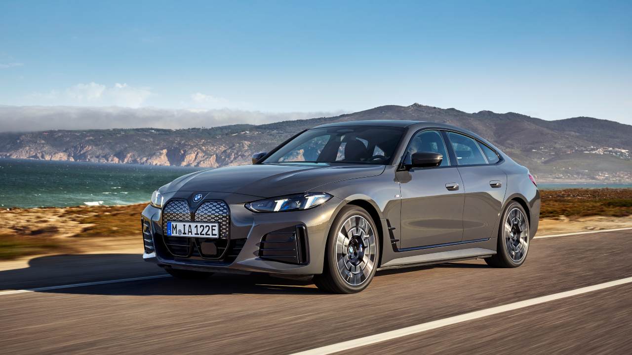 Grey BMW i4 Exterior Front Driving