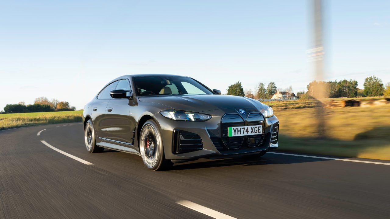 Grey BMW i4 M50 Exterior Front Driving