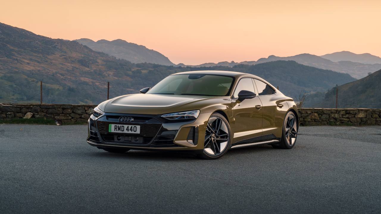 Brown Audi RS e-tron GT Exterior Front Static Sunset