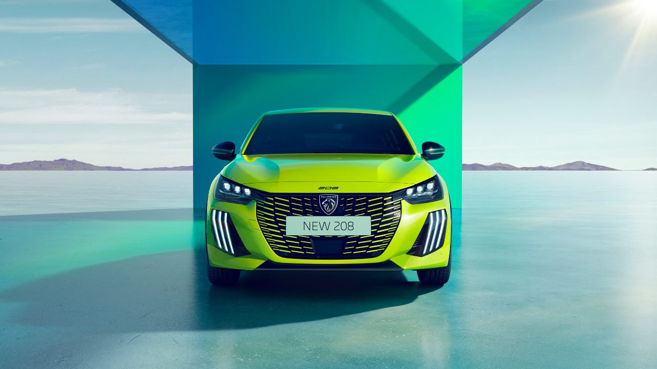 Green Peugeot 208 hatchback shown from the front against a geometric studio backdrop