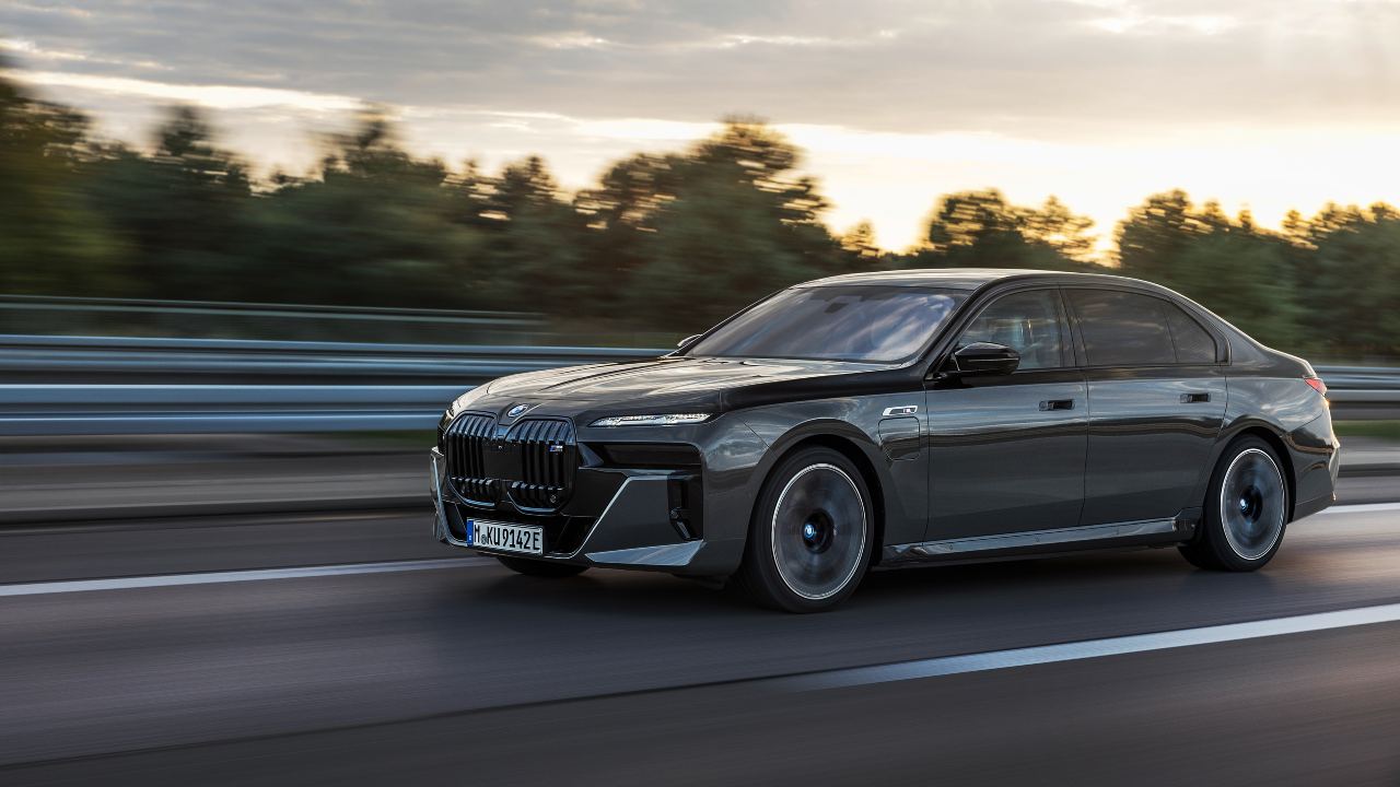 Grey BMW 7 Series luxury saloon driving on a motorway