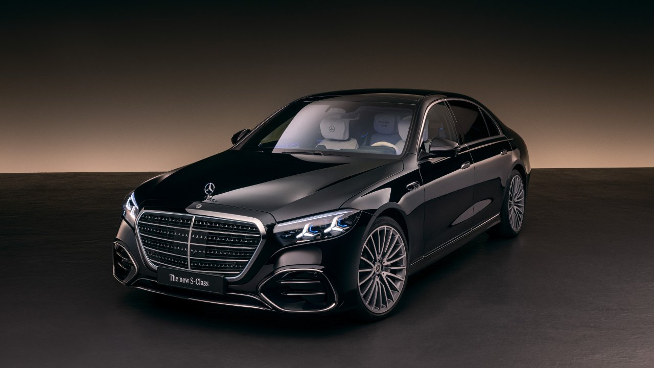 Black Mercedes-Benz S-Class luxury saloon studio image