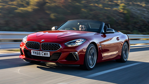 red bmw z4, driving