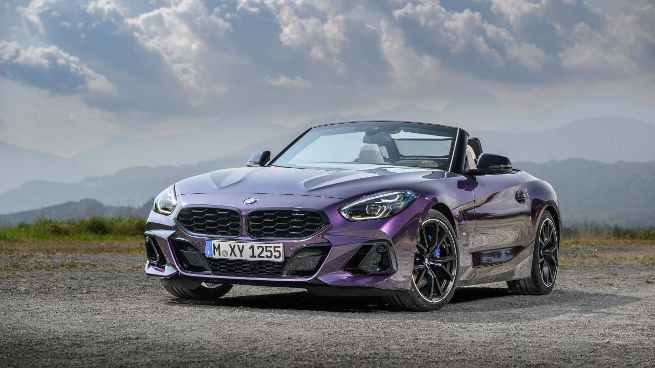 BMW Z4 purple static with roof down