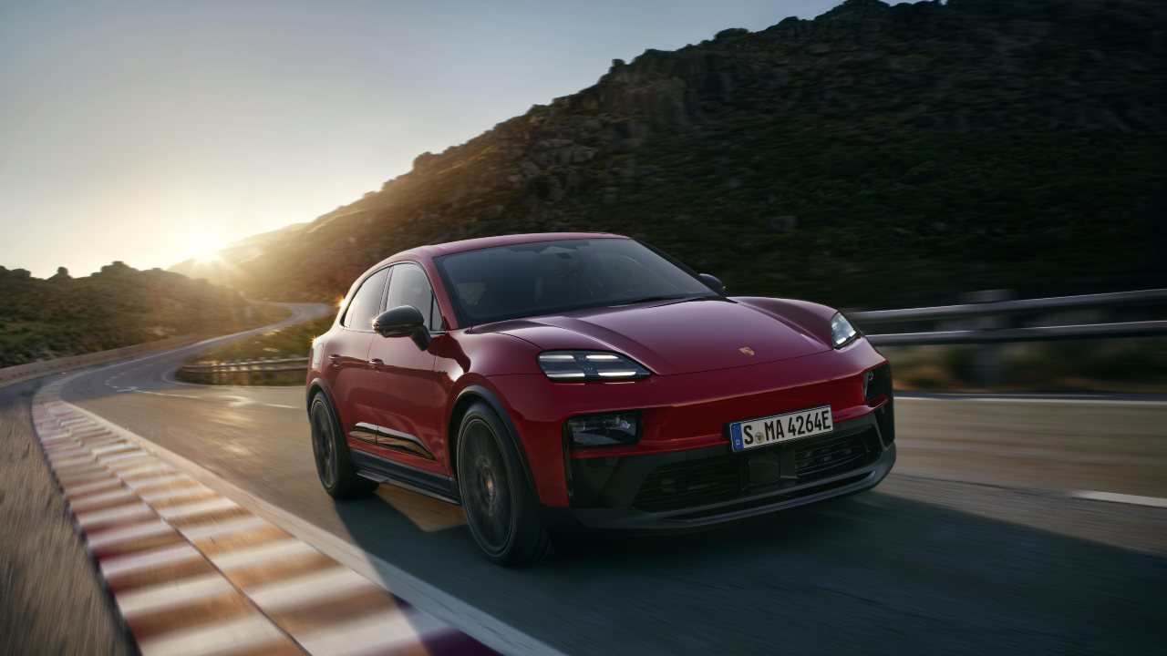 Porsche Macan Electric Red driving on track