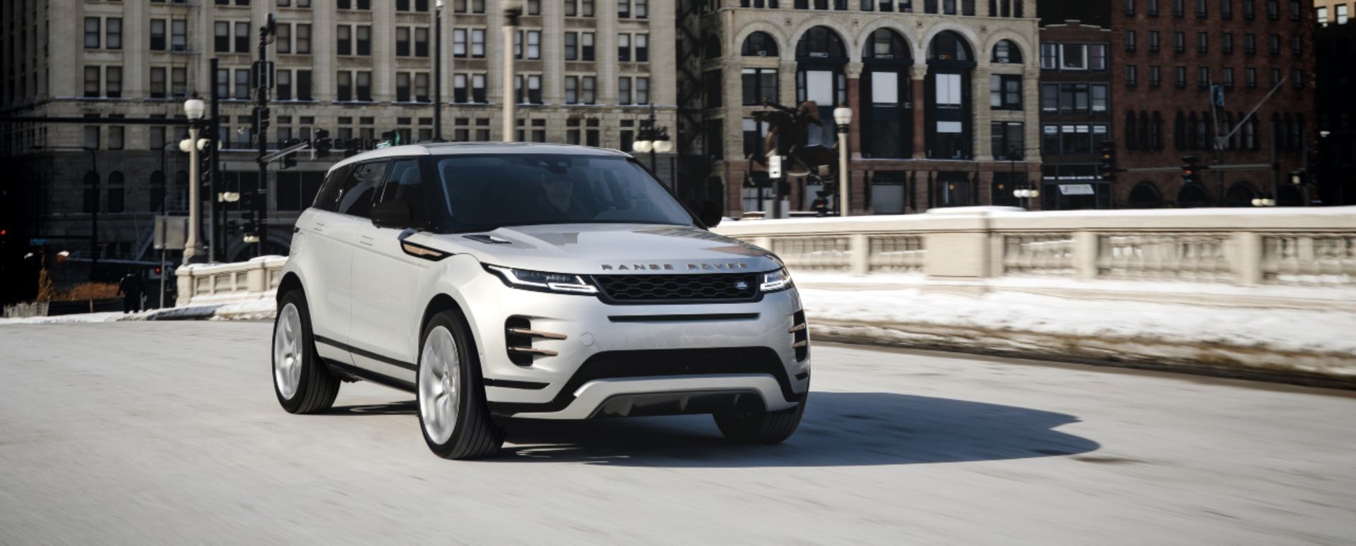 Silver Range Rover Evoque city static