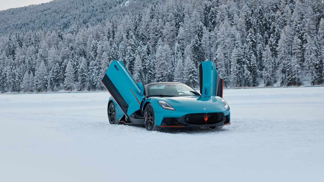 Blue Maserati MCPura Exterior Front on Snow