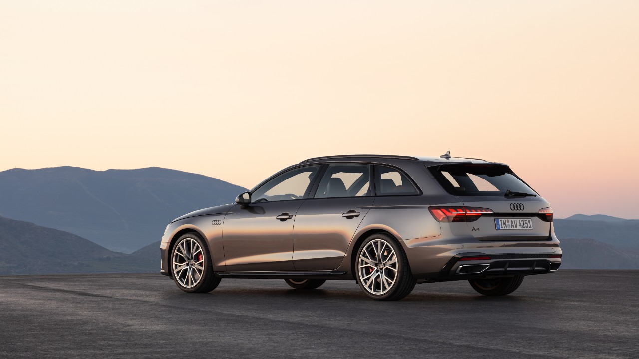 Grey Audi A4 Avant rear at sunset 