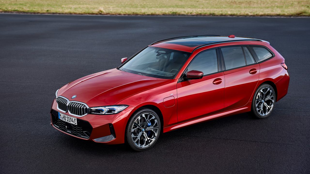 BMW 3 Series Estate red front aerial view