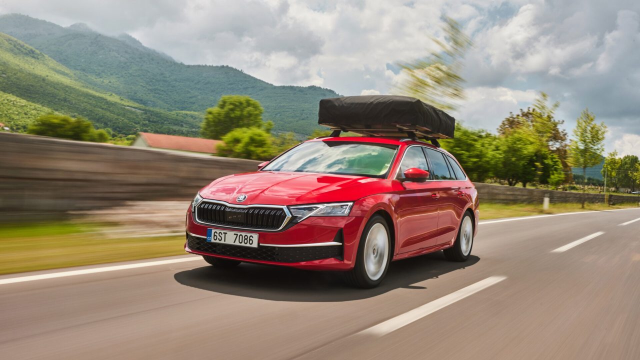 Skoda Octavia Estate red with roofbox
