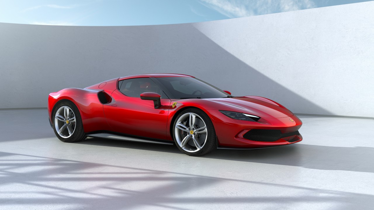 Ferrari 296 GTB in red studio setting, front three-quarter view