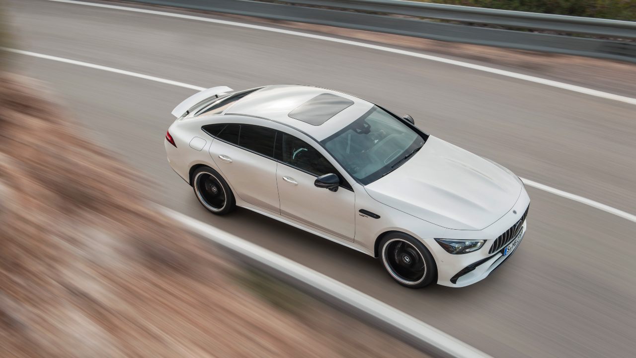 Mercedes-AMG GT 53 4-Door Coupe viewed from above driving on open road
