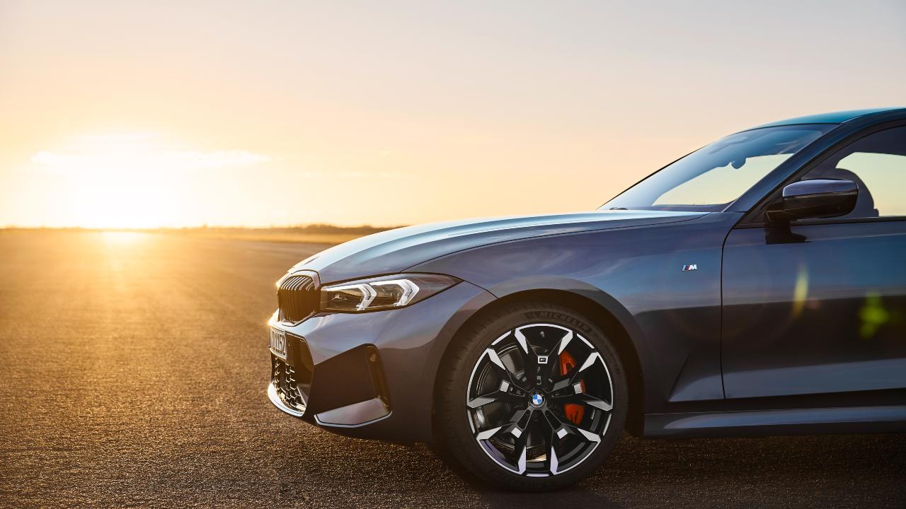 BMW 3 series front end side at sunset