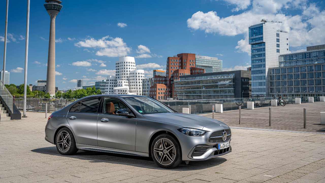 Mercedes-Benz C-Class front left with city background